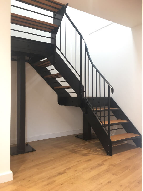 Internal metal staircase with oak treads